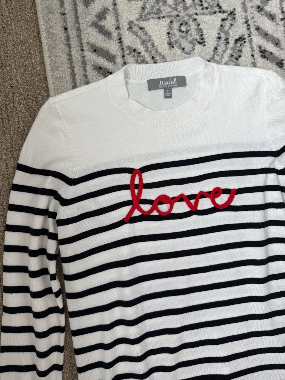 Marled Reunited Clothing Navy/White Striped Sweater with Red Embroidered "love"